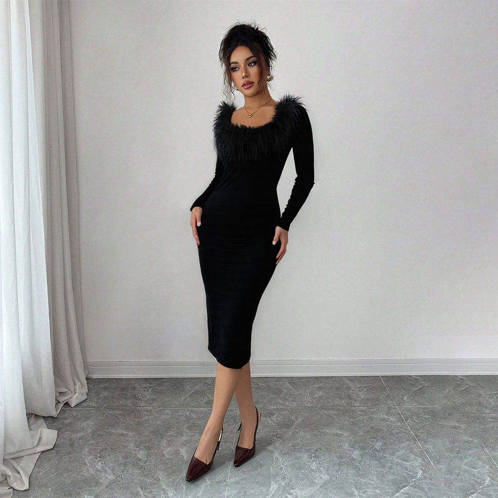 Kvinnors Midi Klänning med Elegant Fjäderdekoration och Sidoslits Mirla-Eva Jonsson