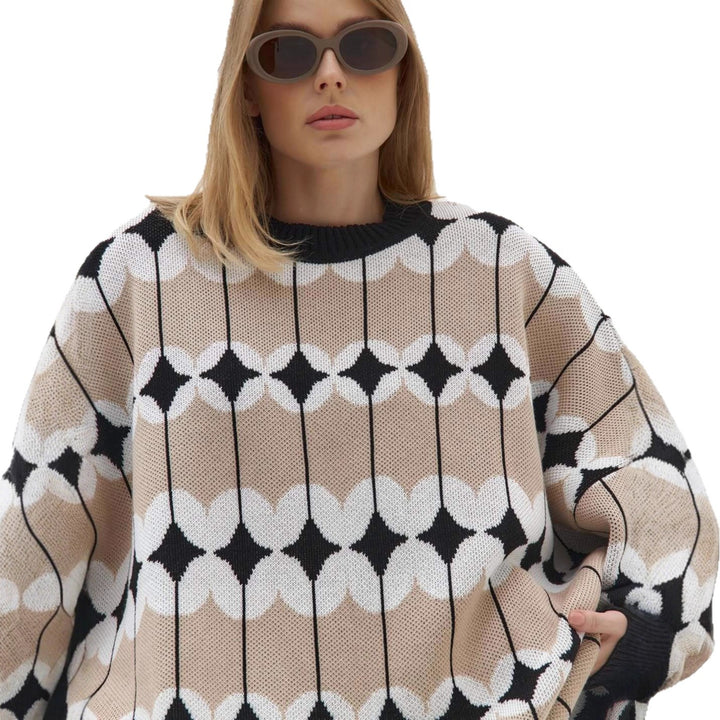Kvinnors Mönstrad Oversized Tröja med Voluminösa Ärmar och Elastiska Manschetter Mirla-Eva Jonsson