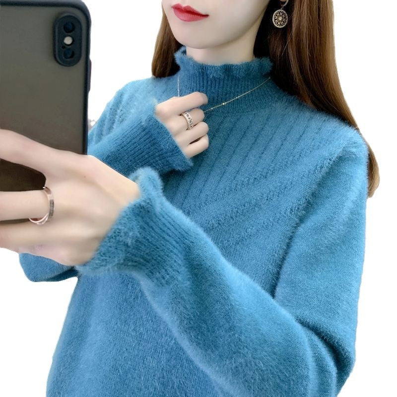 Kvinnors Mysig Rullkrage Tröja med Texturerad Design Mirla-Eva Jonsson