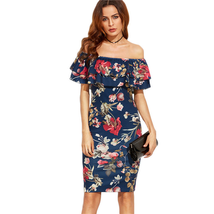 Kvinnors Off-Shoulder Blommig Klänning med Voluminösa Ruffle Detaljer och Figurformande Snitt Mirla-Eva Jonsson