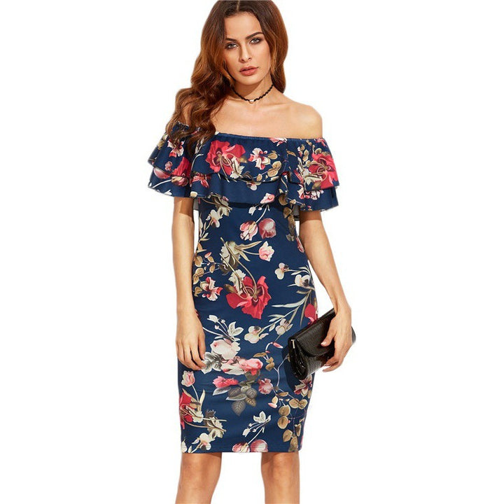 Kvinnors Off-Shoulder Blommig Klänning med Voluminösa Ruffle Detaljer och Figurformande Snitt Mirla-Eva Jonsson