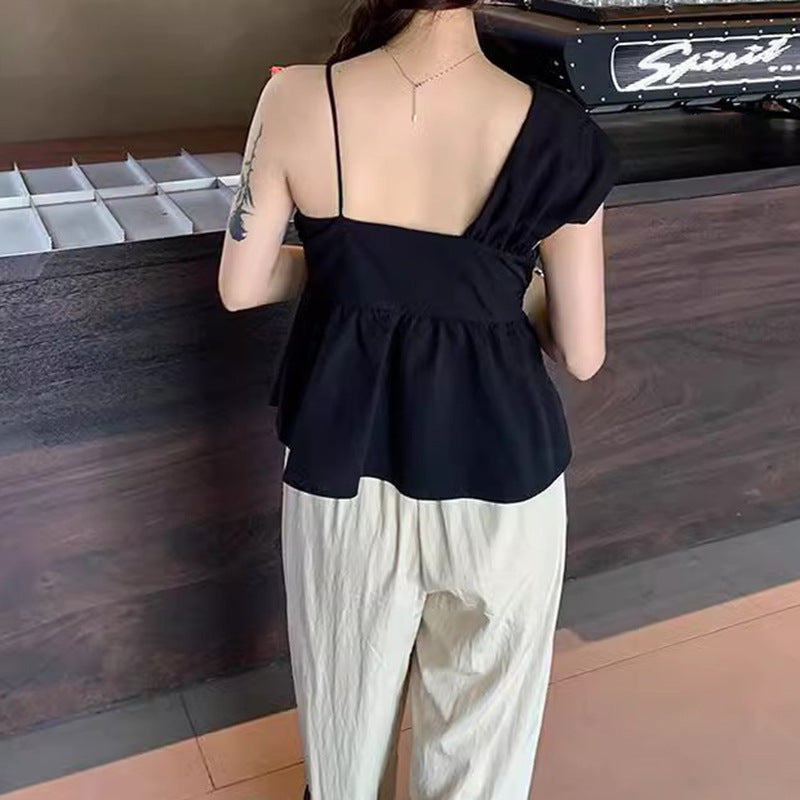 Kvinnors Off-Shoulder Blus med Modernt Draperi och Knytt Detalj-Eva Jonsson
