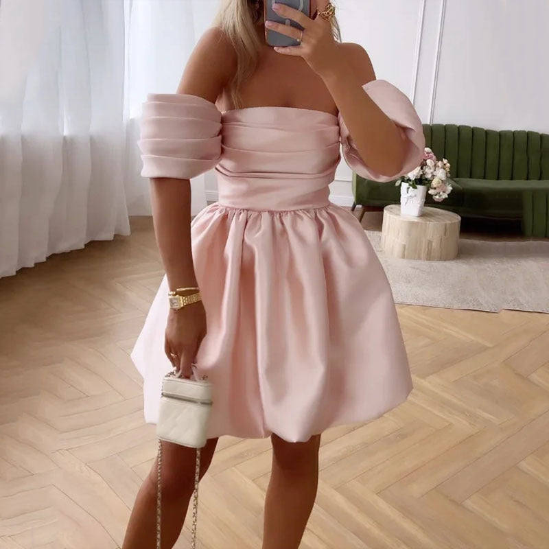 Kvinnors Off-Shoulder Cocktailklänning med eleganta puffärmar och flytande kjol Mirla-Eva Jonsson