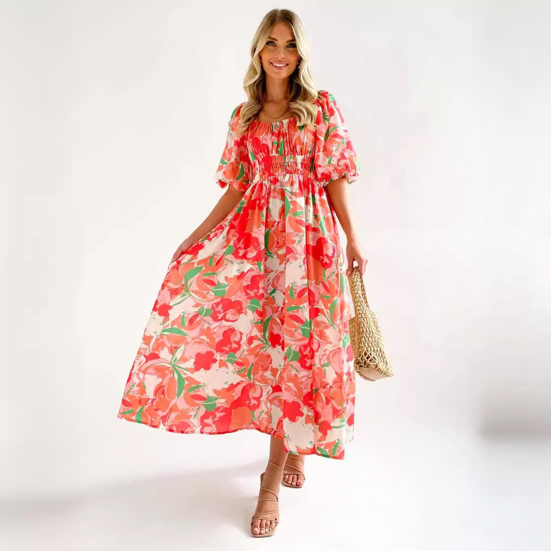 Kvinnors Off-Shoulder Maxi Klänning med Blommönster och Elastisk Midja Mirla-Eva Jonsson