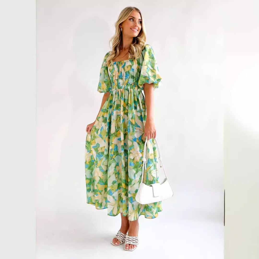 Kvinnors Off-Shoulder Maxi Klänning med Blommönster och Elastisk Midja Mirla-Eva Jonsson