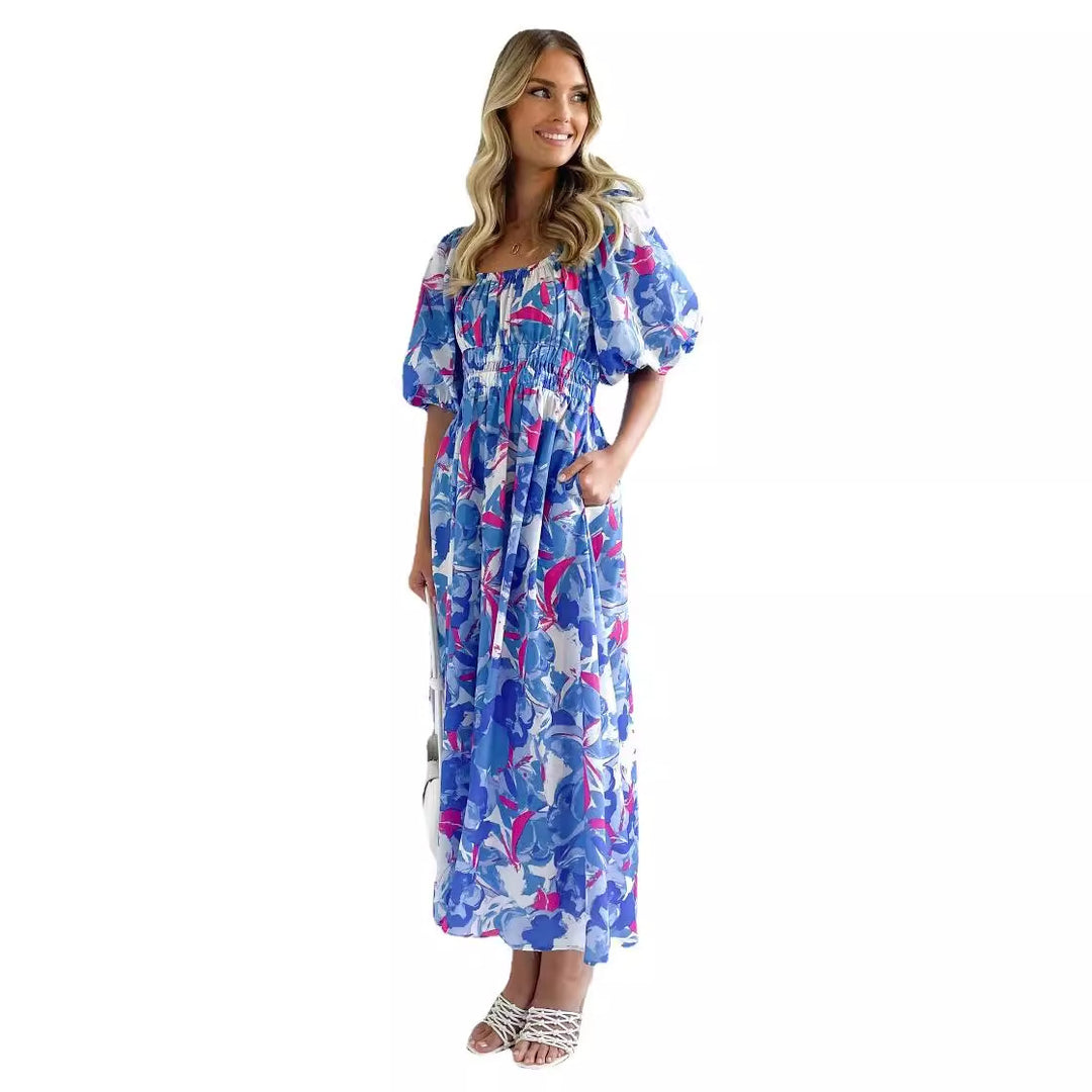 Kvinnors Off-Shoulder Maxi Klänning med Blommönster och Elastisk Midja Mirla-Eva Jonsson