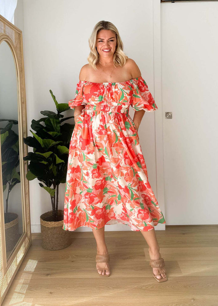 Kvinnors Off-Shoulder Maxi Klänning med Blommönster och Elastisk Midja Mirla-Eva Jonsson