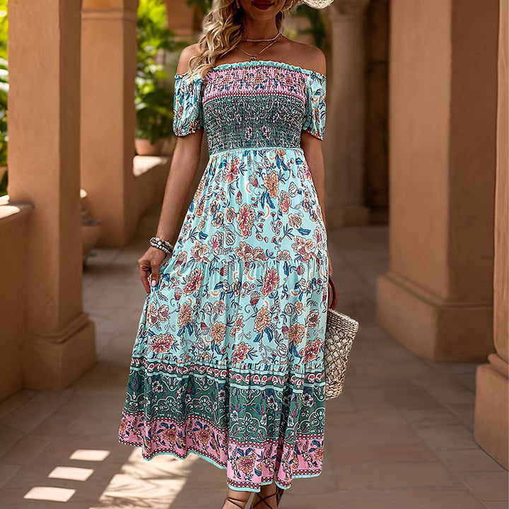 Kvinnors Off-Shoulder Maxi Klänning med Blommönster och Elastisk Midjeband Mirla-Eva Jonsson