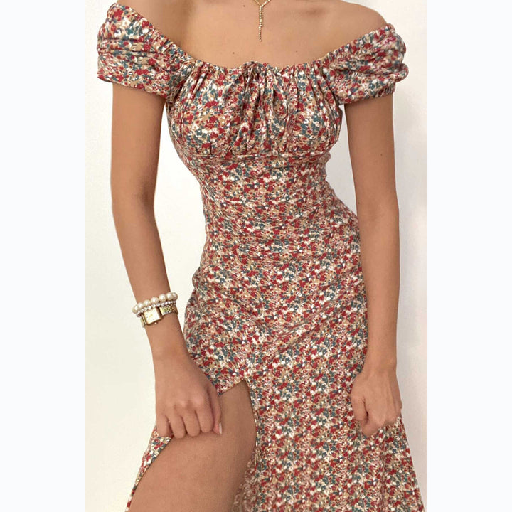 Kvinnors Off-Shoulder Maxi Klänning med Blommönster och Elegant Slits Mirla-Eva Jonsson