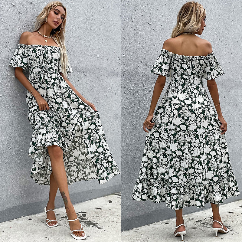 Kvinnors Off-Shoulder Maxi Klänning med Blommönster och Lekfull Sprund Mirla-Eva Jonsson
