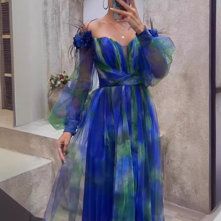 Kvinnors Off-Shoulder Maxi Klänning med Blommönster och Transparenta Volangdetaljer-Eva Jonsson