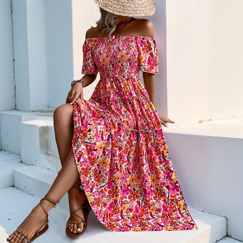 Kvinnors Off-Shoulder Maxi Klänning med Blommönster och Volangdetaljer Mirla-Eva Jonsson
