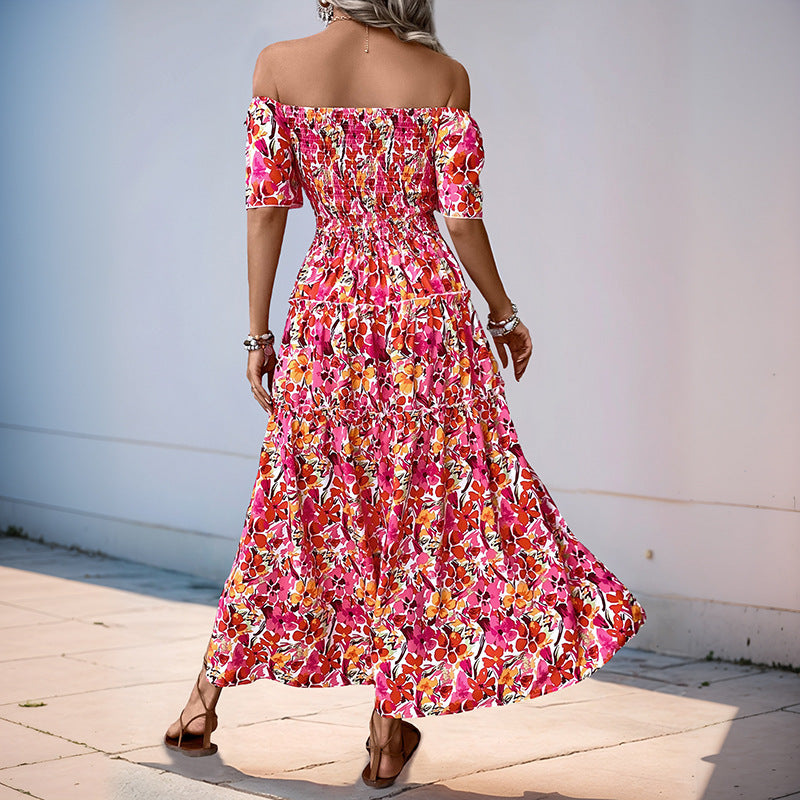 Kvinnors Off-Shoulder Maxi Klänning med Blommönster och Volangdetaljer Mirla-Eva Jonsson