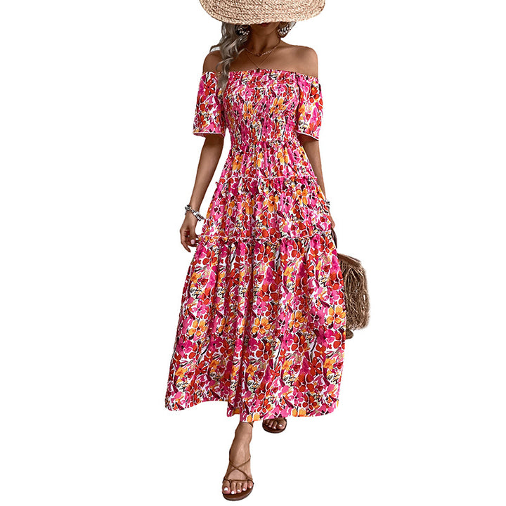 Kvinnors Off-Shoulder Maxi Klänning med Blommönster och Volangdetaljer Mirla-Eva Jonsson