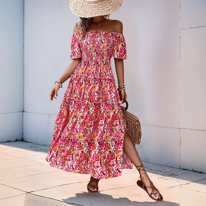 Kvinnors Off-Shoulder Maxi Klänning med Blommönster och Volangdetaljer Mirla-Eva Jonsson