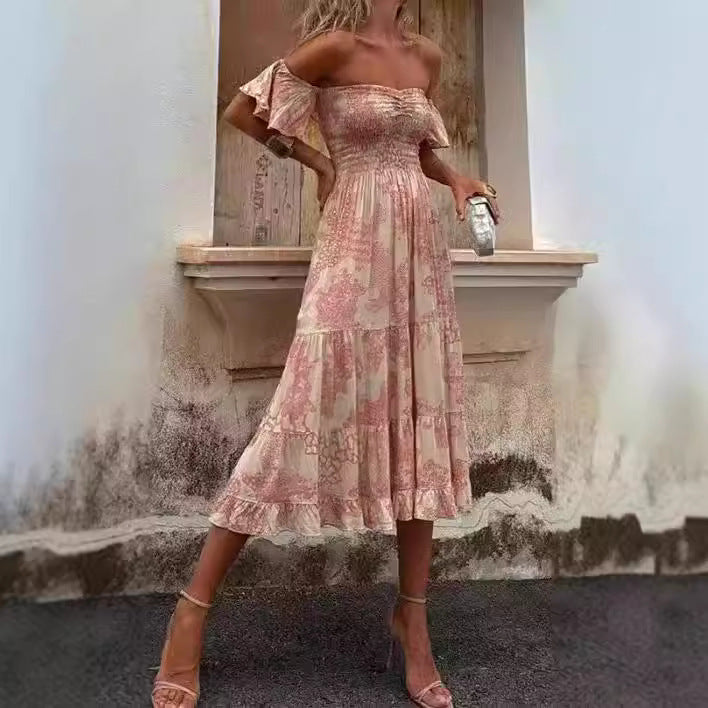 Kvinnors Off-Shoulder Maxi Klänning med Volangdetaljer och Elastisk Midja Mirla-Eva Jonsson