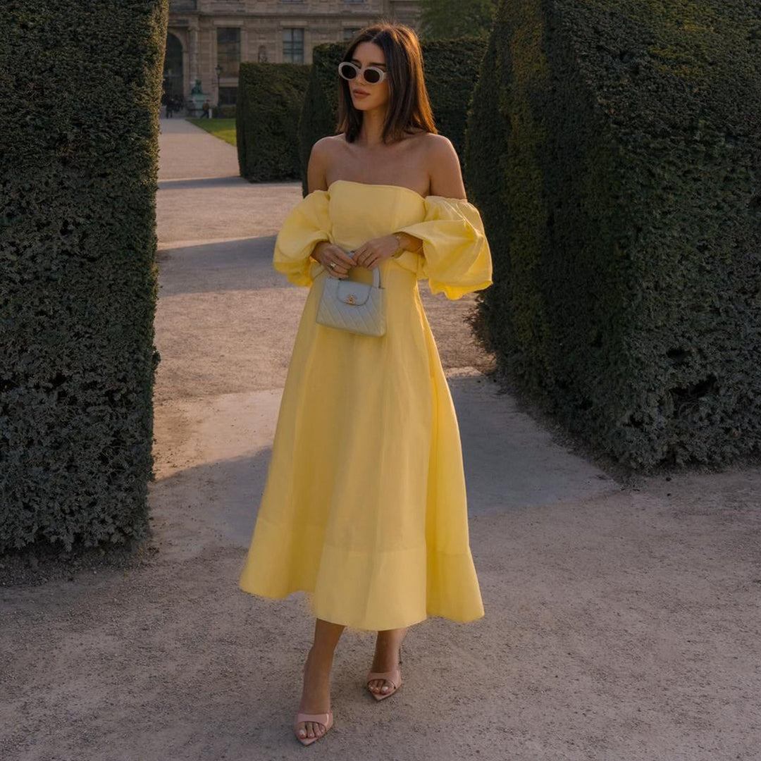 Kvinnors Off-Shoulder Maxi Klänning med Voluminösa Ärmar och Elegant Snitt Mirla-Eva Jonsson