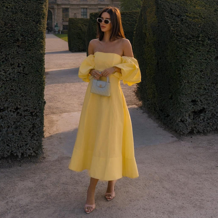 Kvinnors Off-Shoulder Maxi Klänning med Voluminösa Ärmar och Elegant Snitt Mirla-Eva Jonsson