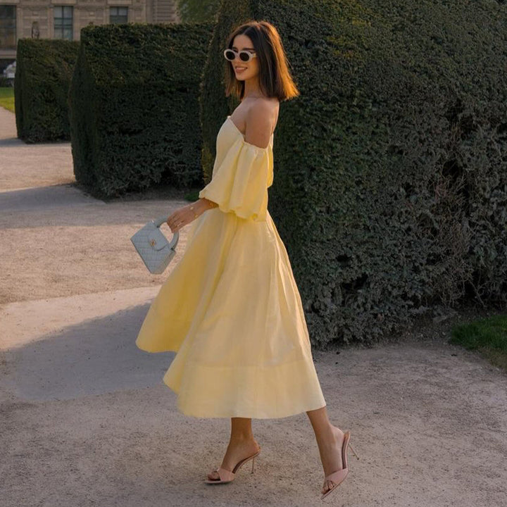 Kvinnors Off-Shoulder Maxi Klänning med Voluminösa Ärmar och Elegant Snitt Mirla-Eva Jonsson