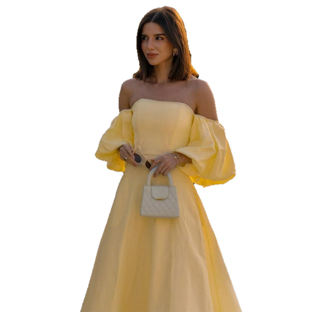 Kvinnors Off-Shoulder Maxi Klänning med Voluminösa Ärmar och Elegant Snitt Mirla-Eva Jonsson
