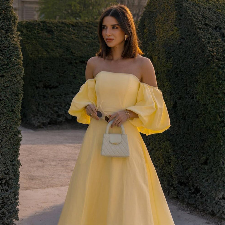 Kvinnors Off-Shoulder Maxi Klänning med Voluminösa Ärmar och Elegant Snitt Mirla-Eva Jonsson