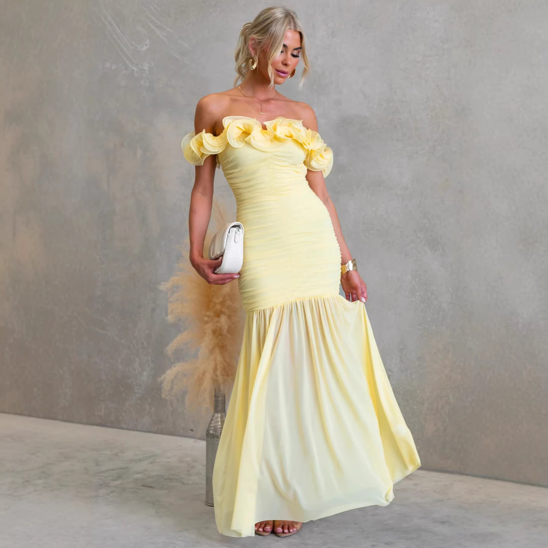 Kvinnors Off-Shoulder Maxi Klänning med Voluminösa Ruffle Detaljer och Elegant Midjeutskärning-Eva Jonsson