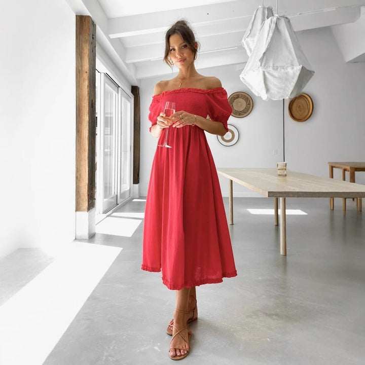 Kvinnors Off-Shoulder Midi Klänning med Luftig Silhuett och Volangdetaljer Mirla-Eva Jonsson
