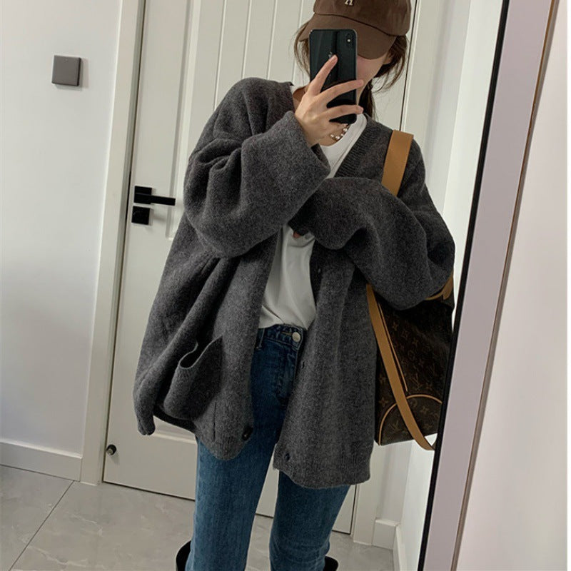Kvinnors Oversized Cardigan med Praktiska Fickor och V-Hals Klänning-Eva Jonsson