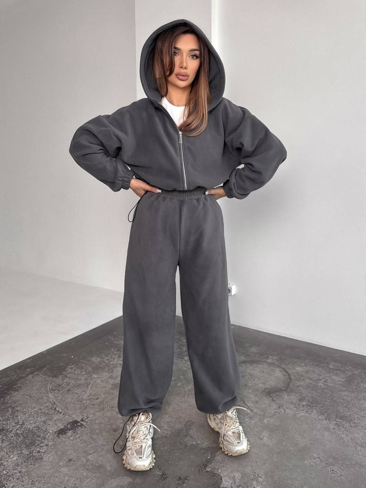 Kvinnors Oversized Fleece Träningsoverall med Huva och Vida Ben Mirla-Eva Jonsson