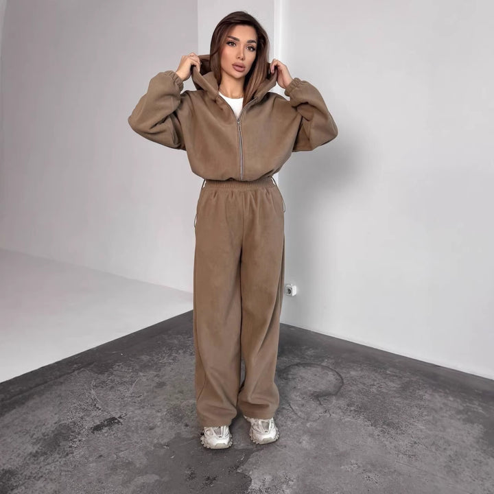 Kvinnors Oversized Fleece Träningsoverall med Huva och Vida Ben Mirla-Eva Jonsson