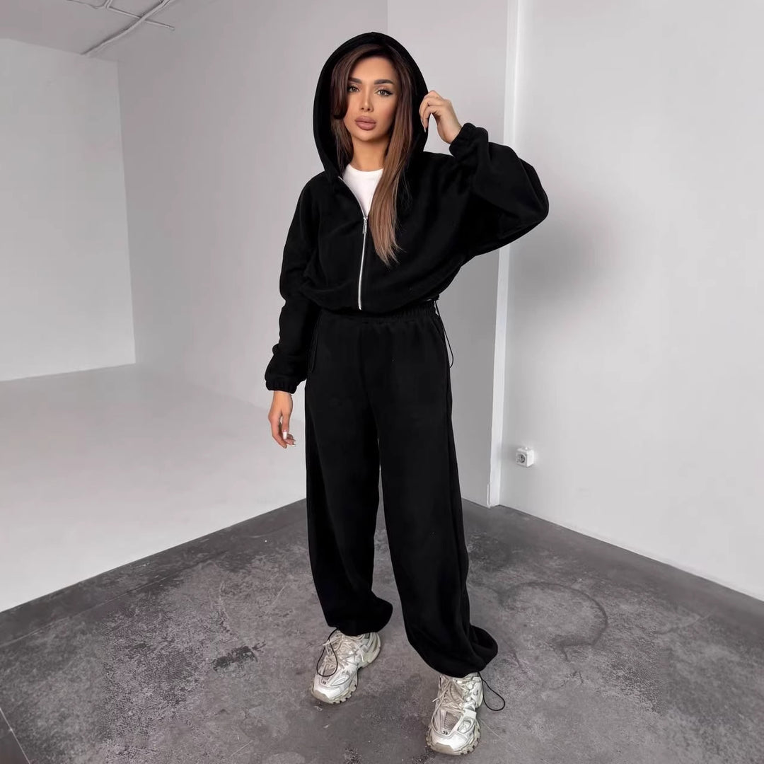 Kvinnors Oversized Fleece Träningsoverall med Huva och Vida Ben Mirla-Eva Jonsson