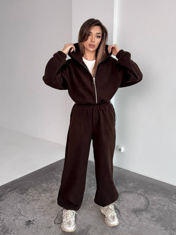Kvinnors Oversized Fleece Träningsoverall med Huva och Vida Ben Mirla-Eva Jonsson