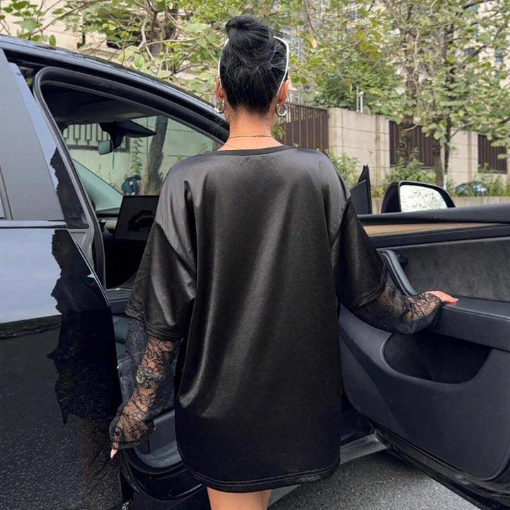 Kvinnors Oversized Sport T-Shirt med Spännande Mesh Ärmdesign Mirla-Eva Jonsson