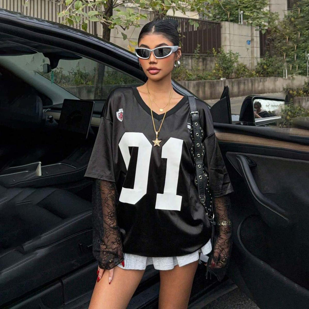Kvinnors Oversized Sport T-Shirt med Spännande Mesh Ärmdesign Mirla-Eva Jonsson