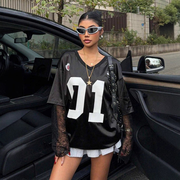 Kvinnors Oversized Sport T-Shirt med Spännande Mesh Ärmdesign Mirla-Eva Jonsson