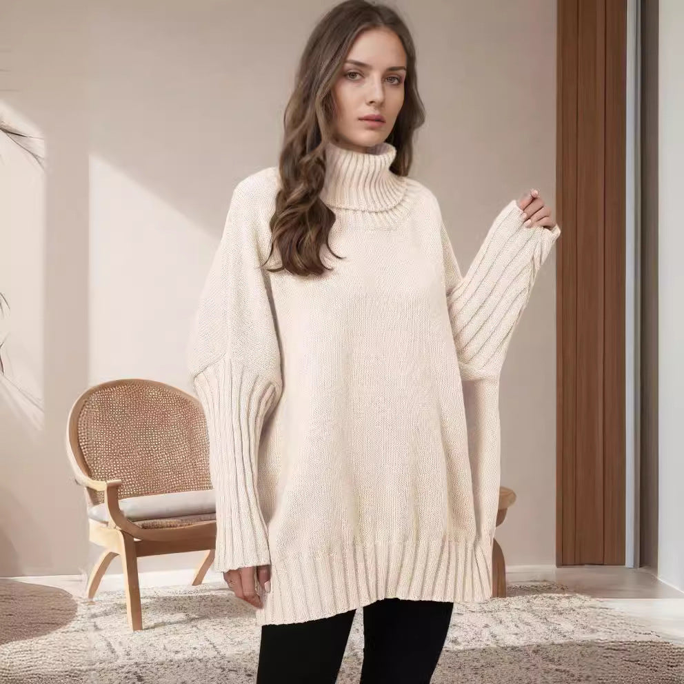 Kvinnors Oversized Stickad Tröja med Hög Krage och Voluminösa Ärmar Mirla-Eva Jonsson