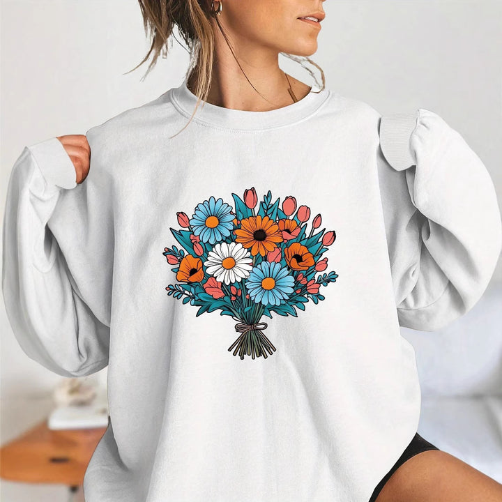 Kvinnors Oversized Sweatshirt med Blommiga Grafikdetaljer Mirla-Eva Jonsson