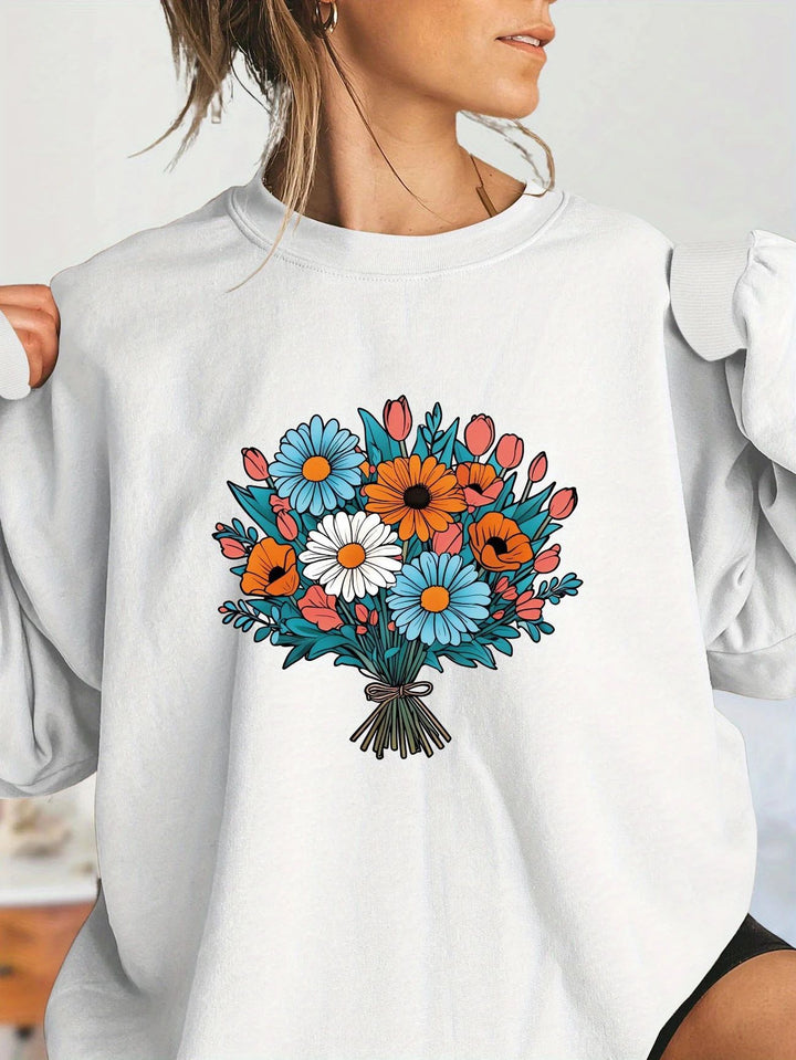 Kvinnors Oversized Sweatshirt med Blommiga Grafikdetaljer Mirla-Eva Jonsson