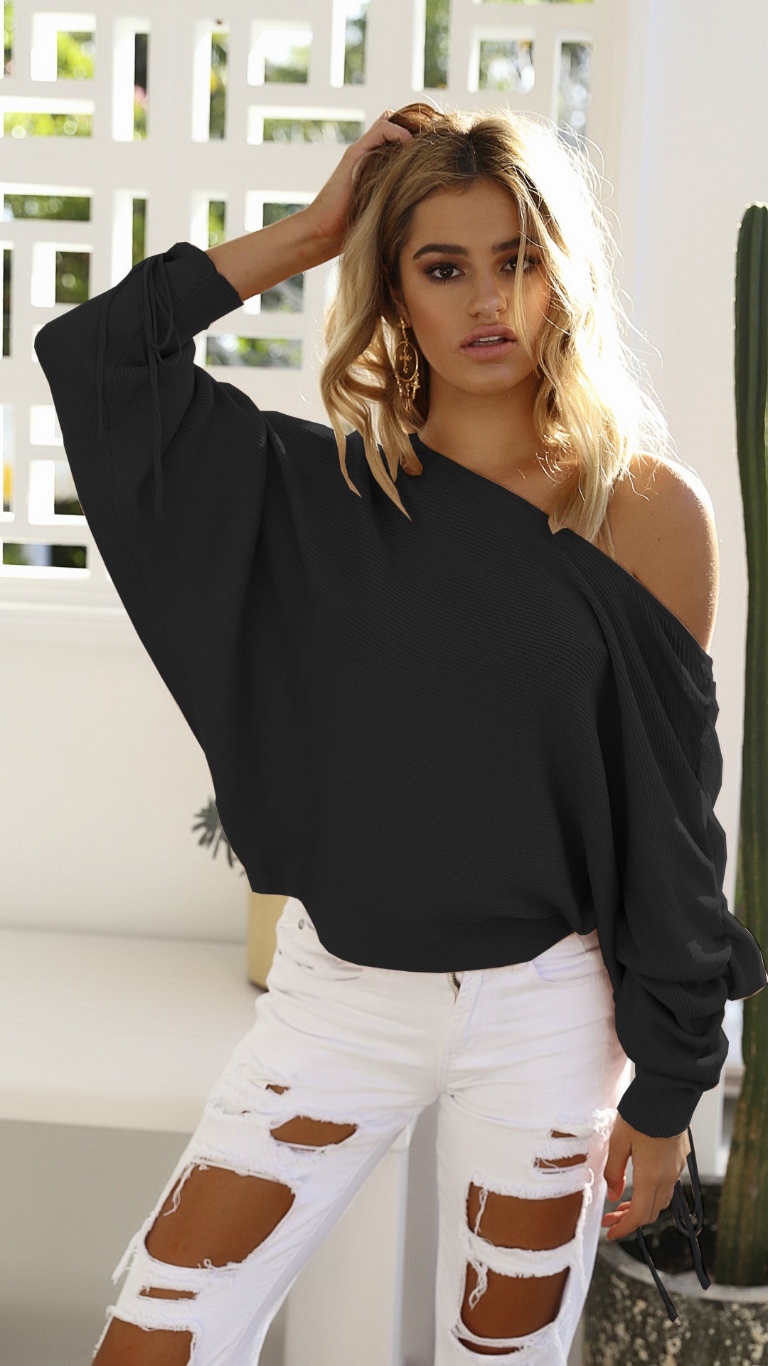 Kvinnors Oversized Tröja med Asymmetrisk Skärning Mirla-Eva Jonsson