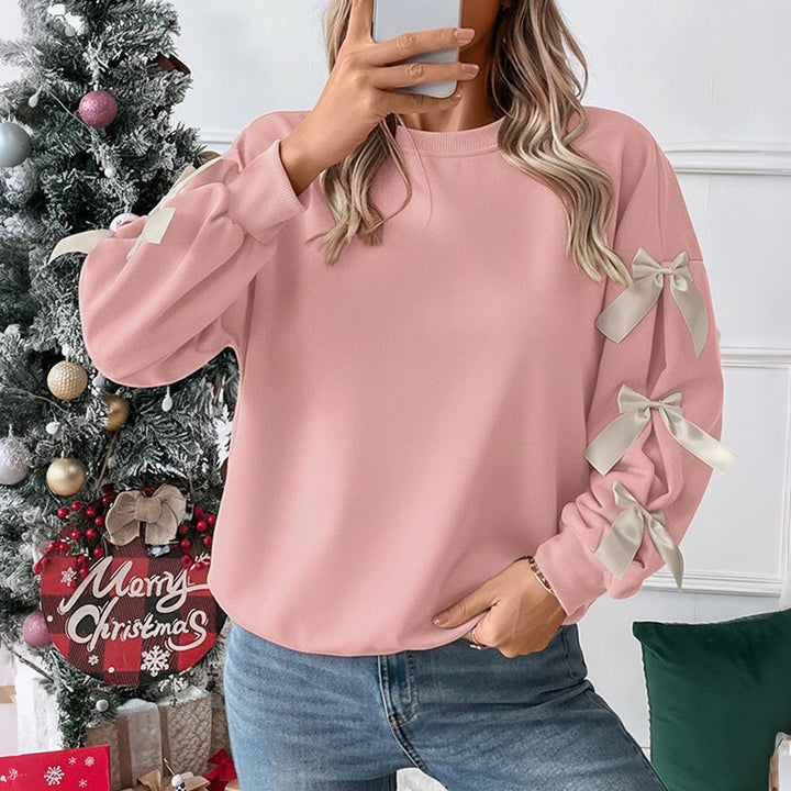 Kvinnors Oversized Tröja med Lekfulla Klänkningsdetaljer Mirla-Eva Jonsson