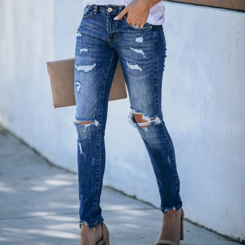 Kvinnors Skinny Jeans med trendig förstörd look och figurnära skärning Mirla-Eva Jonsson