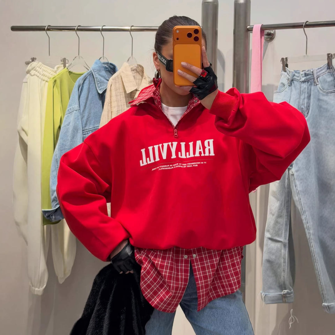Kvinnors Sportig Zip Tröja i Avslappnad Design Mirla-Eva Jonsson