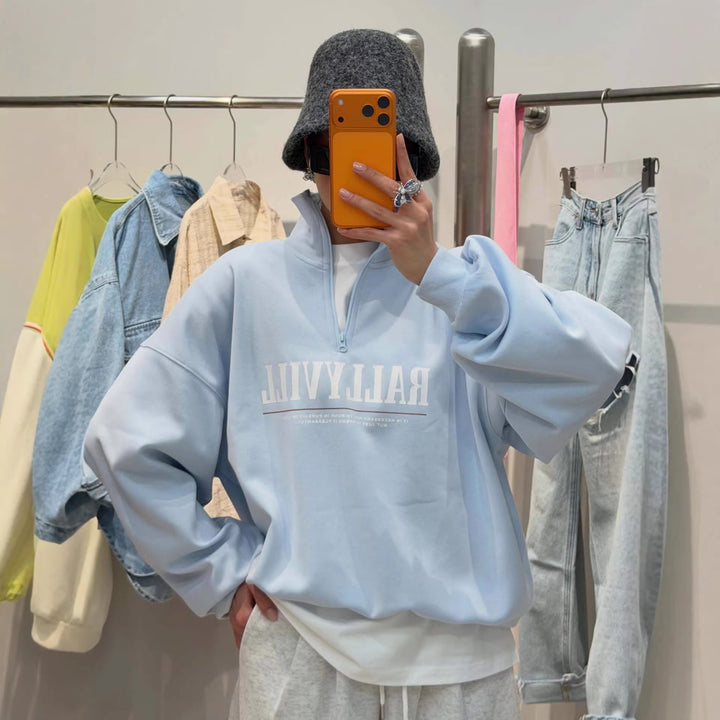 Kvinnors Sportig Zip Tröja i Avslappnad Design Mirla-Eva Jonsson