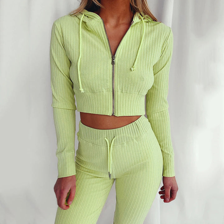 Kvinnors Sportiga Crop Top och Leggings Set Mirla-Eva Jonsson