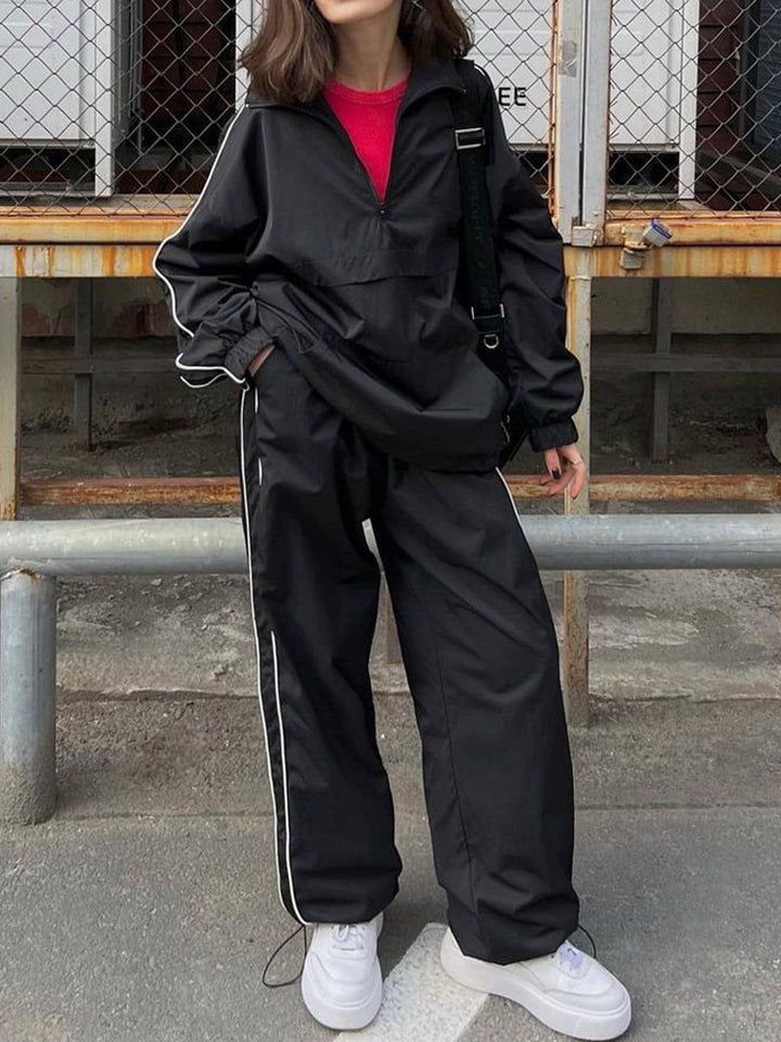 Kvinnors Sportiga Vindskydd och Joggingbyxor Set Mirla-Eva Jonsson