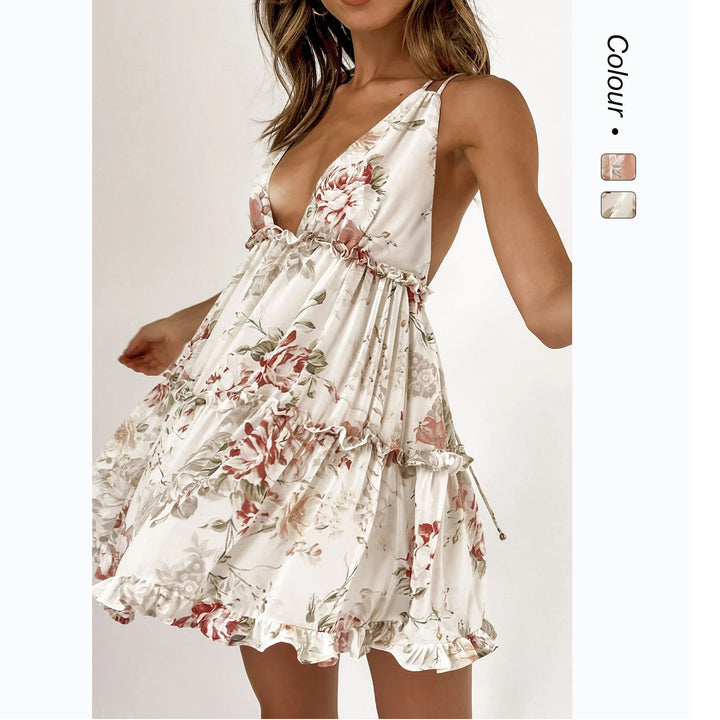 Kvinnors Strålande Sommardress med Flödande Snitt och Blommig Design-Eva Jonsson