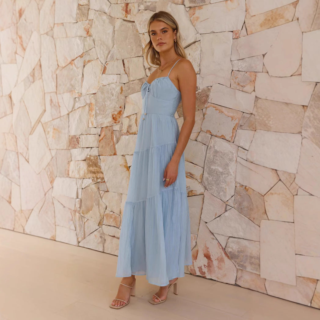 Kvinnors Swing Maxi Klänning med Dekorativ Snörning och Volanger Mirla-Eva Jonsson