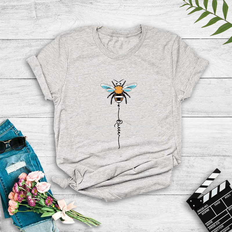 Kvinnors T-shirt med kreativt bi-design Mirla-Eva Jonsson