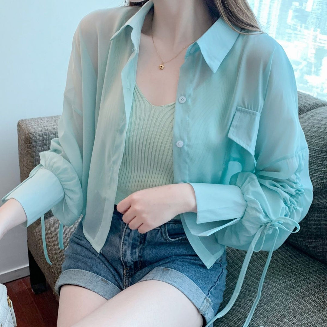Kvinnors Transparent Blus med Innovativa Detaljer Mirla-Eva Jonsson