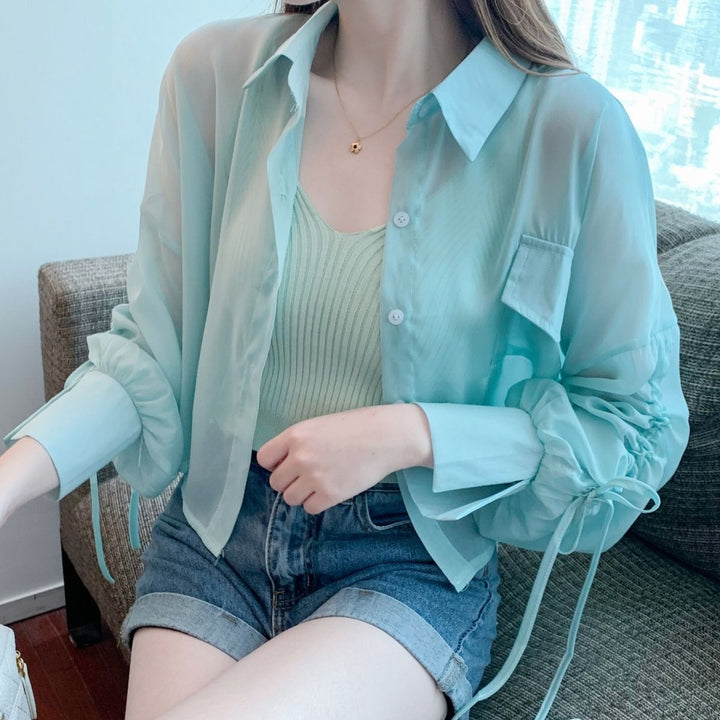 Kvinnors Transparent Blus med Innovativa Detaljer Mirla-Eva Jonsson